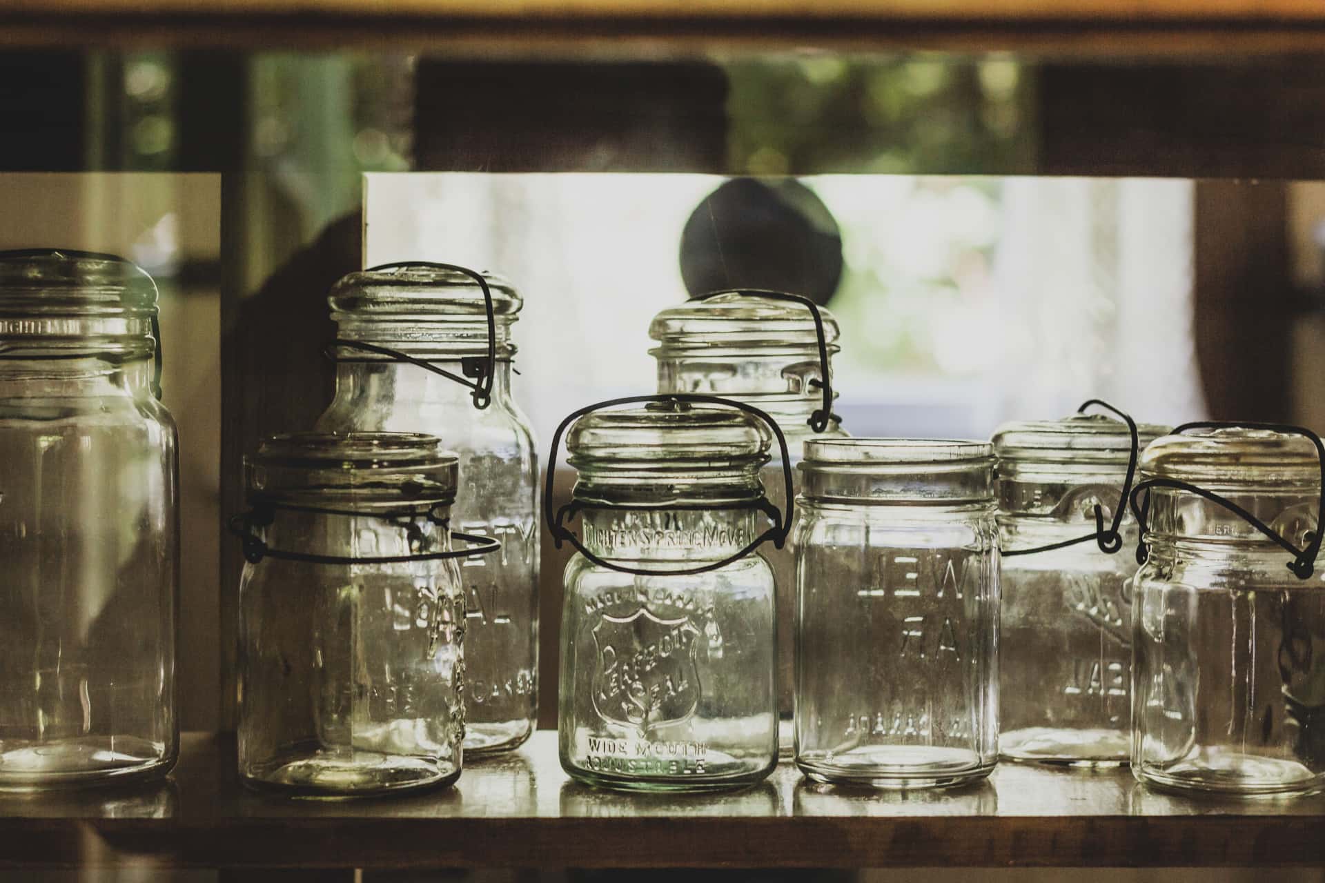 Rows of empty glass mason jars